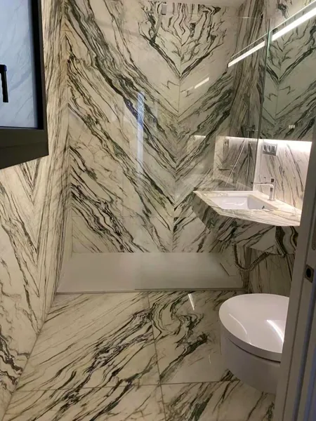 Bathroom clad from floor to ceiling