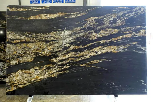 Kitchen in black stone with golden veins