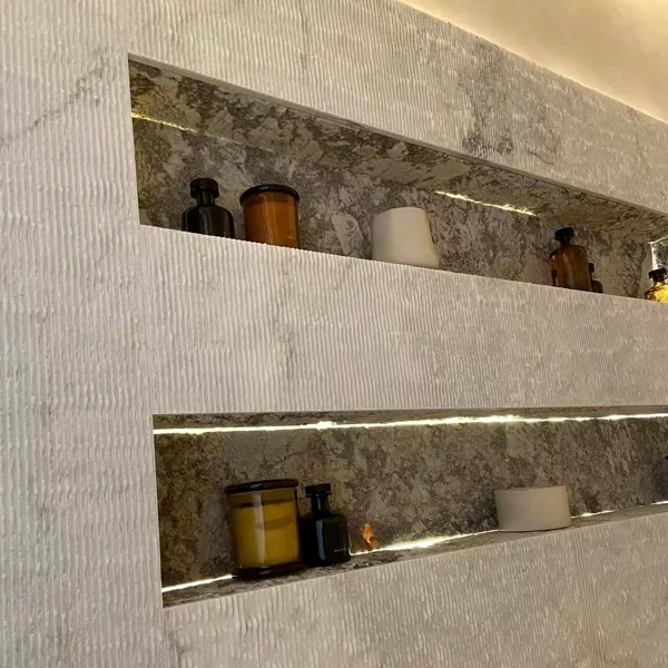 Wall with lit niches