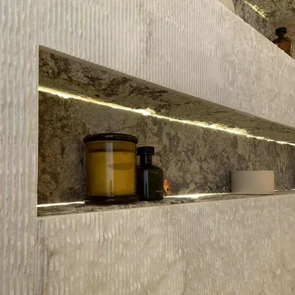 Wall with lit niches